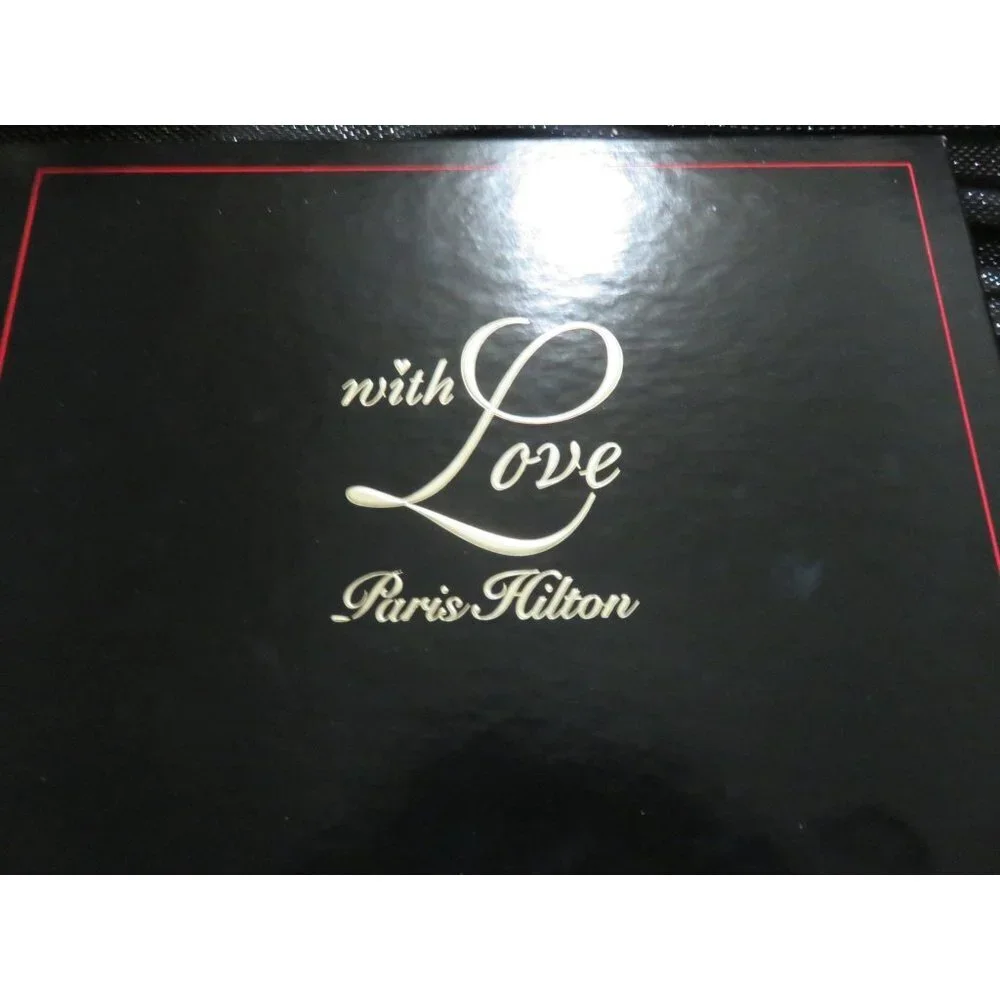 Paris Hilton 4 Pc Gift Set 3.4oz EDP Spray, Rollerball, Body Lotion & Shower Gel